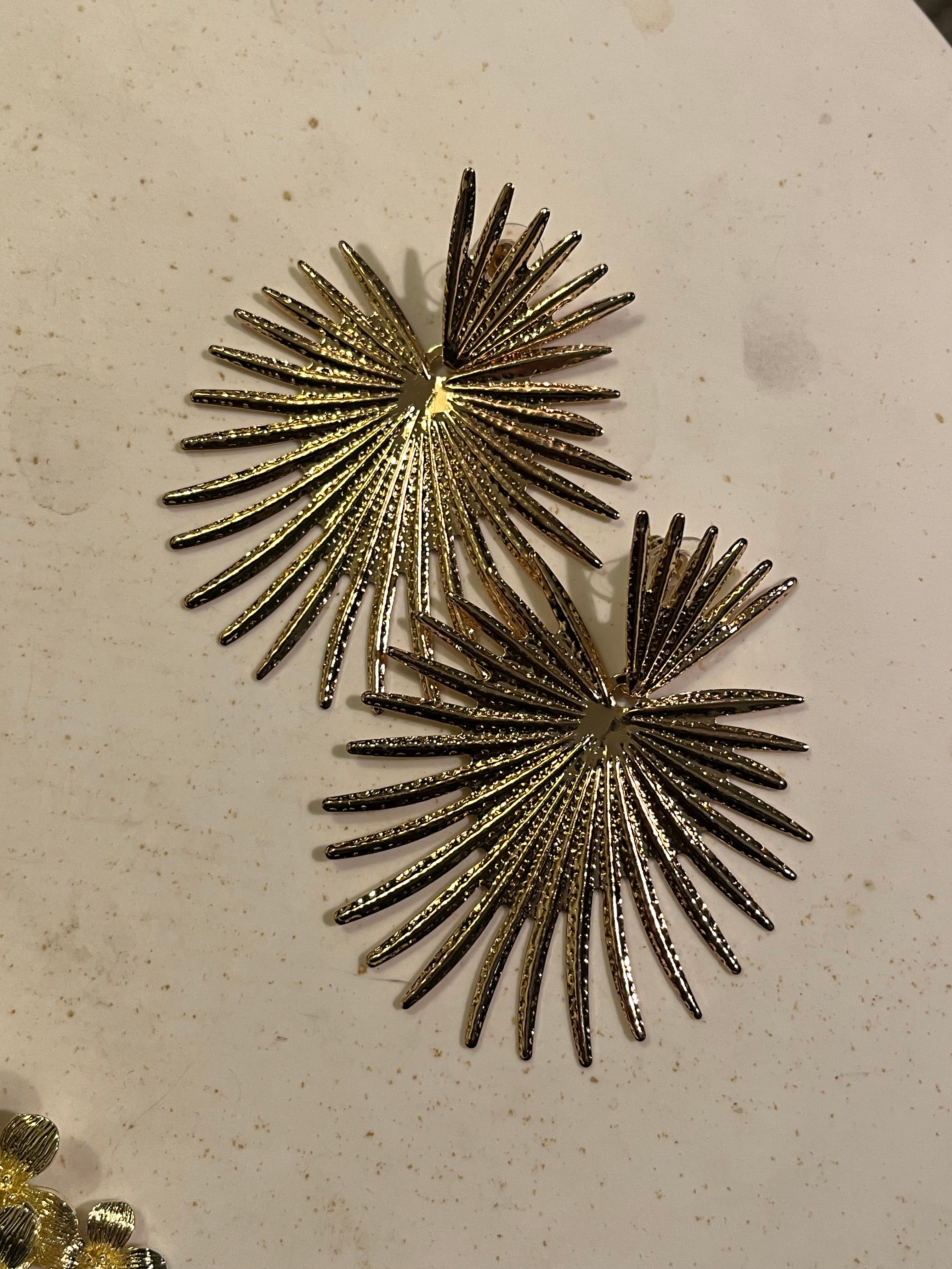 Aros corazón fuego dorados