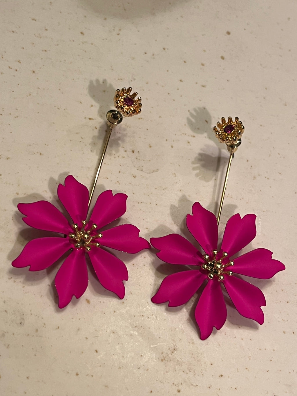 Flores colgantes fucsia